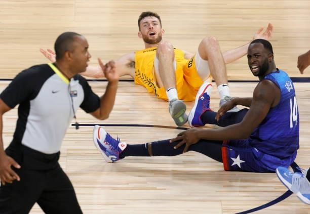 Nick Kay of the Australia Boomers and Draymond Green of the United States react after Kay fouled Green during an exhibition game at Michelob Ultra...