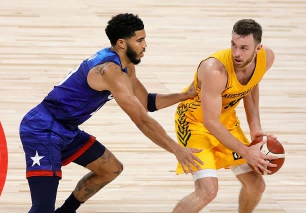 Nick Kay of the Australia Boomers is guarded by Jayson Tatum of the United States during an exhibition game at Michelob Ultra Arena ahead of the...