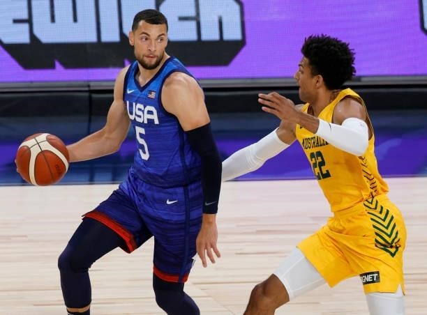 Zach LaVine of the United States is guarded by Matisse Thybulle of the Australia Boomers during an exhibition game at Michelob Ultra Arena ahead of...