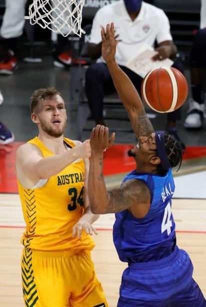 Jock Landale of the Australia Boomers defends against Bradley Beal of the United States during an exhibition game at Michelob Ultra Arena ahead of...