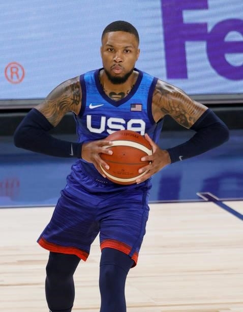 Damian Lillard of the United States passes against the Australia Boomers during an exhibition game at Michelob Ultra Arena ahead of the Tokyo Olympic...