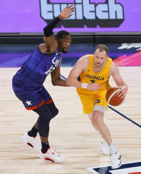 Joe Ingles of the Australia Boomers drives against Bam Adebayo of the United States during an exhibition game at Michelob Ultra Arena ahead of the...