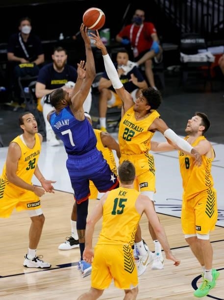 Matisse Thybulle of the Australia Boomers blocks a shot by Kevin Durant of the United States during an exhibition game at Michelob Ultra Arena ahead...
