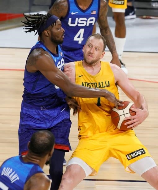 Joe Ingles of the Australia Boomers drives to the basket against Jerami Grant of the United States during an exhibition game at Michelob Ultra Arena...