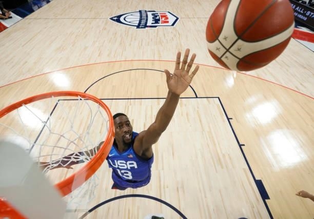 Bam Adebayo of the United States tries to block a shot by the Australia Boomers during an exhibition game at Michelob Ultra Arena ahead of the Tokyo...
