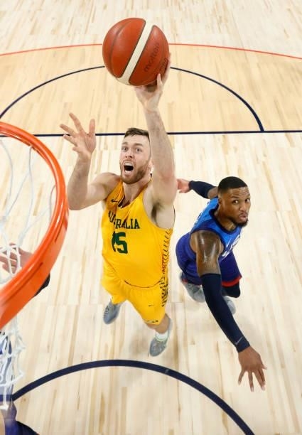 Nick Kay of the Australia Boomers shoots against Damian Lillard of the United States during an exhibition game at Michelob Ultra Arena ahead of the...