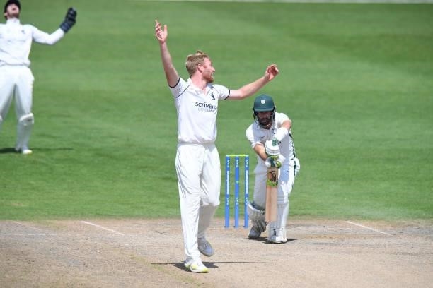 Liam Norwell of Warwickshire celebrates taking the wicket of Daryl Mitchell of Worcestershire during the LV = Insurance County Championship match...