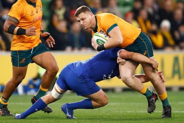Angus Bell of the Wallabies is tackled during the International Test match between the Australian Wallabies and France at AAMI Park on July 13, 2021...