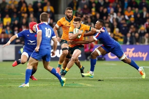 Tom Banks of the Wallabies breaks a tackle during the International Test match between the Australian Wallabies and France at AAMI Park on July 13,...