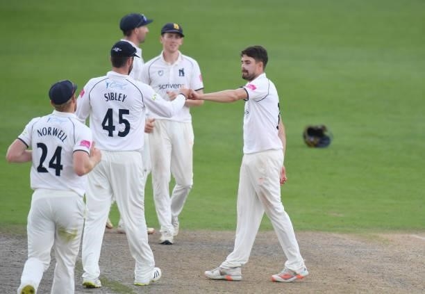Will Rhodes of Warwickshire celebrates taking the wicket of Brett D'Oliveira of Worcestershire during the LV = Insurance County Championship match...
