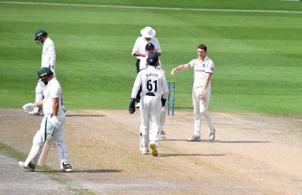 Rob Yates of Warwickshire celebrates taking the wicket of Joe Leach of Worcestershire during the LV = Insurance County Championship match between...