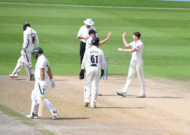 Rob Yates of Warwickshire celebrates taking the wicket of Joe Leach of Worcestershire during the LV = Insurance County Championship match between...