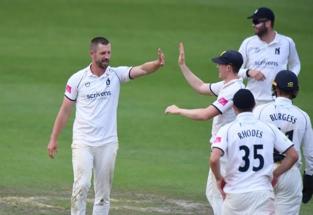 Matthew Lamb of Warwickshire celebrates taking the wicket of Ish Sodhi of Worcestershire during the LV = Insurance County Championship match between...
