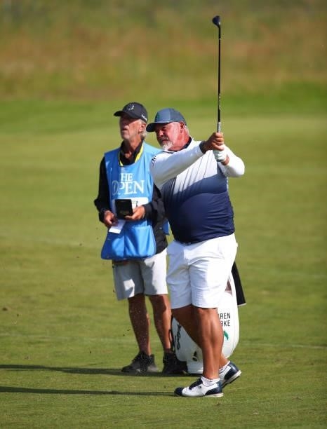 Darren Clarke of Northern Ireland plays a shot during a practice round prior to The 149th Open at Royal St George’s Golf Club on July 13, 2021 in...