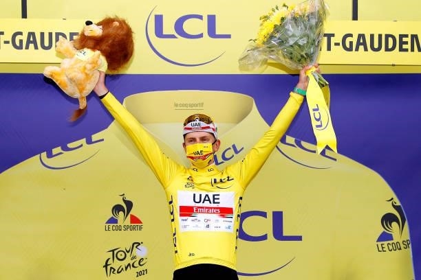 Tadej Pogačar of Slovenia and UAE-Team Emirates yellow leader jersey celebrates at podium during the 108th Tour de France 2021, Stage 16 a 169km...