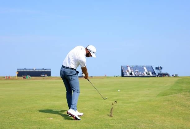 Dustin Johnson of The United States plays a shot during a practice round for The 149th Open at Royal St George’s Golf Club on July 13, 2021 in...