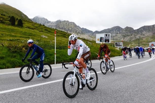 Guillaume Boivin, from Israel Start-Up Nation, and Oliver Naesen and Greg Van Avermaet, from AG2R Citroen Team, during the 108th Tour de France 2021,...