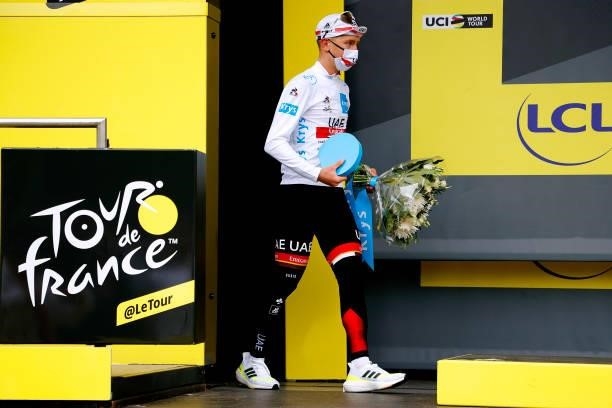 Tadej Pogačar of Slovenia and UAE-Team Emirates white best young jersey celebrates at podium during the 108th Tour de France 2021, Stage 16 a 169km...