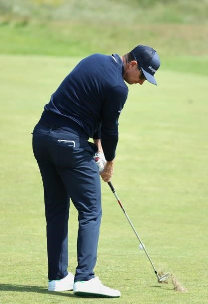 Justin Rose of England plays a shot during a practice round for The 149th Open at Royal St George’s Golf Club on July 13, 2021 in Sandwich, England.