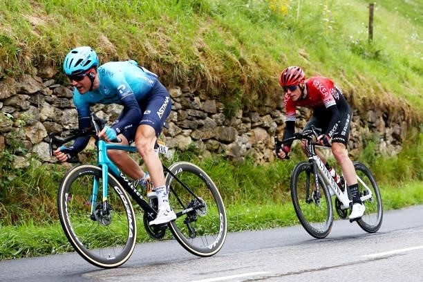 Hugo Houle of Canada and Team Astana - Premier Tech & Connor Swift of The United Kingdom and Team Arkéa Samsic during the 108th Tour de France 2021,...