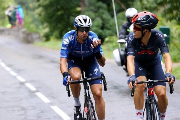 Mattia Cattaneo of Italy and Team Deceuninck - Quick-Step & Michał Kwiatkowski of Poland and Team INEOS Grenadiers during the 108th Tour de France...