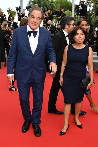 Oliver Stone and Sun-jung Jung attend the "The French Dispatch