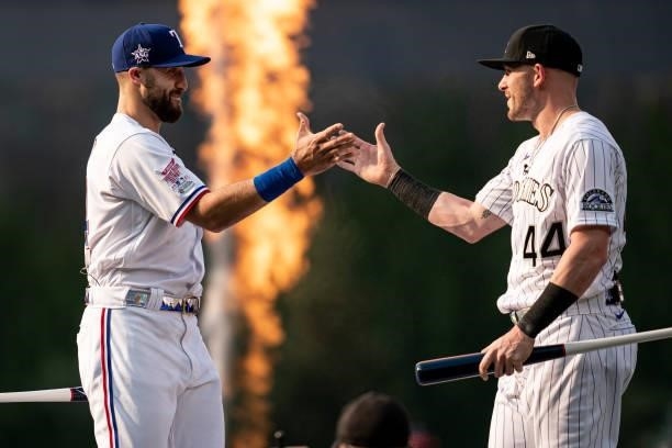 American League All-Star Joey Gallo of the Texas Rangers and Trevor Story of the Colorado Rockies high five during the 2021 T-Mobile Home Run Derby...