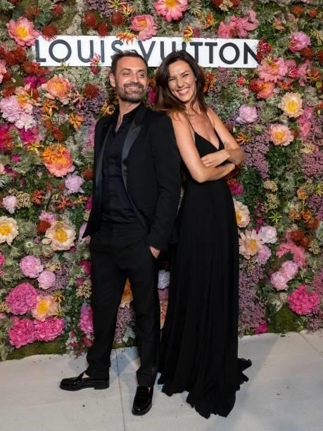 Augustin Trapenard and Doria Tillier attends the Louis Vuitton Dinner at Fred L'Ecailler during the 74th annual Cannes Film Festival on July 13, 2021...