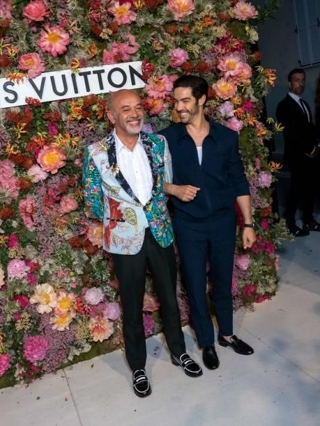 Christian Louboutin and Tahar Rahim attends the Louis Vuitton Dinner at Fred L'Ecailler during the 74th annual Cannes Film Festival on July 13, 2021...