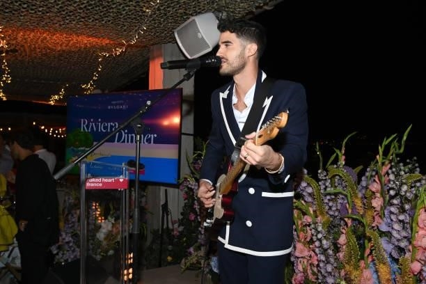 Darren Criss performs during the Naked Heart France Riviera Dinner 2021 during the 74th annual Cannes Film Festival on July 13, 2021 in Cannes,...