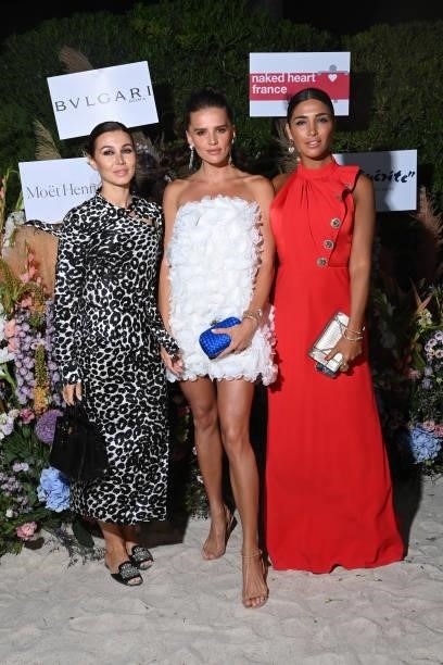 Olga Glotser, Anna Andres and Santa Dimopulos attend the Naked Heart France Riviera Dinner 2021 during the 74th annual Cannes Film Festival on July...