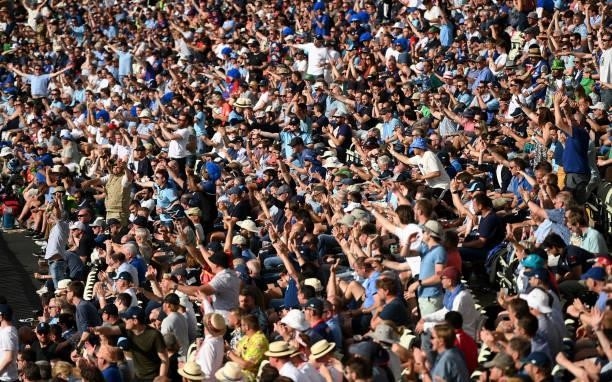 Cricket fans enjoy play during the 3rd Royal London Series One Day International between England and Pakistan at Edgbaston on July 13, 2021 in...