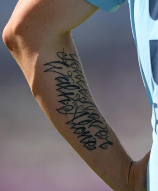 Tattoo reading 'You'll Never Walk Alone' on Brydon Carse of England during the 3rd One Day International between England and Pakistan at Edgbaston on...