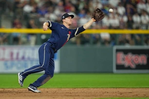 American League All-Star Joey Wendle of the Tampa Bay Rays reaches for the ball during the 91st MLB All-Star Game presented by Mastercard at Coors...