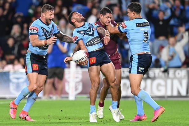 Apisai Koroisau of the Blues celebrates with team mates after scoring a try during game three of the 2021 State of Origin Series between the New...