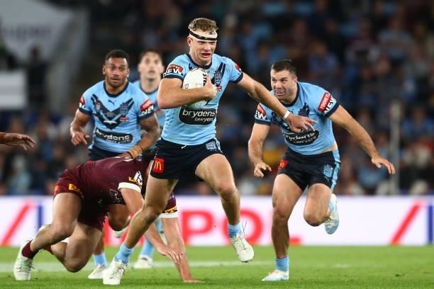 Tom Trbojevic of the Blues makes a break during game three of the 2021 State of Origin Series between the New South Wales Blues and the Queensland...