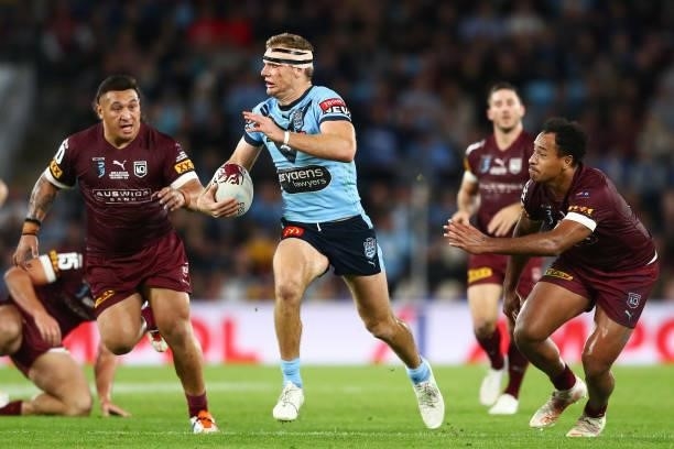 Tom Trbojevic of the Blues makes a break during game three of the 2021 State of Origin Series between the New South Wales Blues and the Queensland...