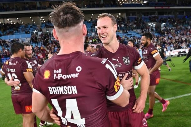 Daly Cherry-Evans of the Maroons and Alexander Brimson of the Maroons celebrate winning game three of the 2021 State of Origin Series between the New...