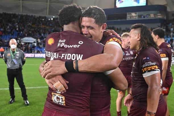 Hamiso Tabuai-Fidow of the Maroons and Dane Gagai of the Maroons celebrate winning game three of the 2021 State of Origin Series between the New...