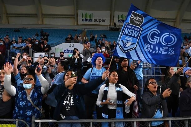Blues fans celebrate after game three of the 2021 State of Origin Series between the New South Wales Blues and the Queensland Maroons at Cbus Super...