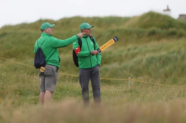 Marshals look on during a practice round for The 149th Open at Royal St George’s Golf Club on July 14, 2021 in Sandwich, England.