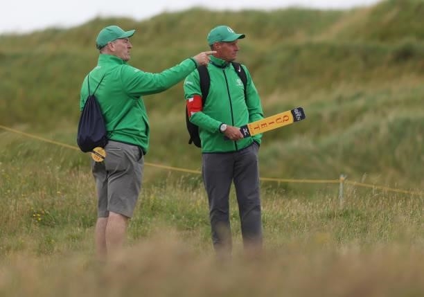 Marshals look on during a practice round for The 149th Open at Royal St George’s Golf Club on July 14, 2021 in Sandwich, England.