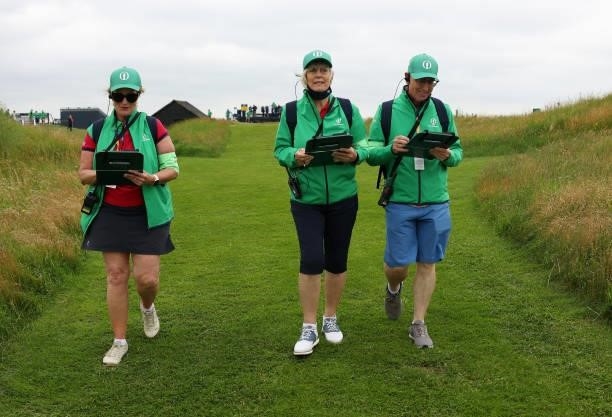 Marshals walk during a practice round for The 149th Open at Royal St George’s Golf Club on July 14, 2021 in Sandwich, England.