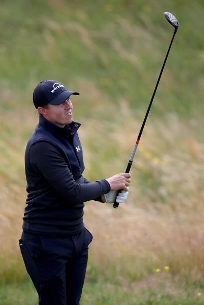 Matt Fitzpatrick of England plays a shot on the seventh hole during a practice round ahead of The 149th Open at Royal St George’s Golf Club on July...