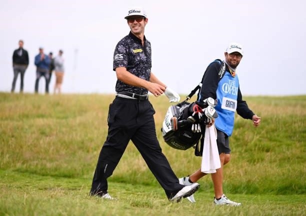 Lanto Griffin of The United States and caddie walk on the 17th hole during a practice round for The 149th Open at Royal St George’s Golf Club on July...