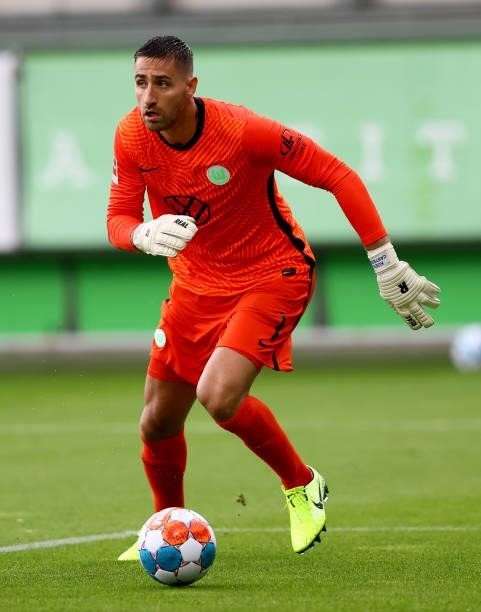 Koen Casteels, goalkeeper of VfL Wolfsburg controls the ball during a pre-season friendly match between VfL Wolfsburg and Holstein Kiel at...