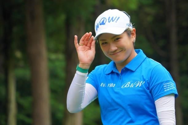 Misuzu Narita of Japan greets photographers on the 6th tee during the pro-am ahead of the GMO Internet Ladies Samantha Thavasa Global Cup at Eagle...