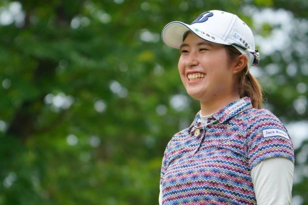 Momoko Osato of Japan smiles after her tee shot on the 7th hole during the pro-am ahead of the GMO Internet Ladies Samantha Thavasa Global Cup at...
