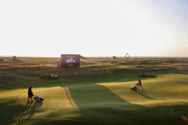 General view across the course as greenkeepers tend to the greens prior to Day One of The 149th Open at Royal St George’s Golf Club on July 15, 2021...