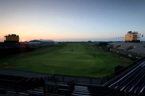 The sun rises over the eighteenth hole during Day One of The 149th Open at Royal St George’s Golf Club on July 15, 2021 in Sandwich, England.